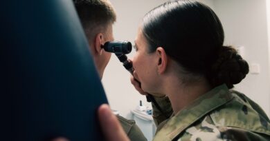 U.S. Airman 1st Class Ashley Polk, 86th Operational Medical Readiness Squadron warrior medicine medical technician, performs an ear inspection at Rams