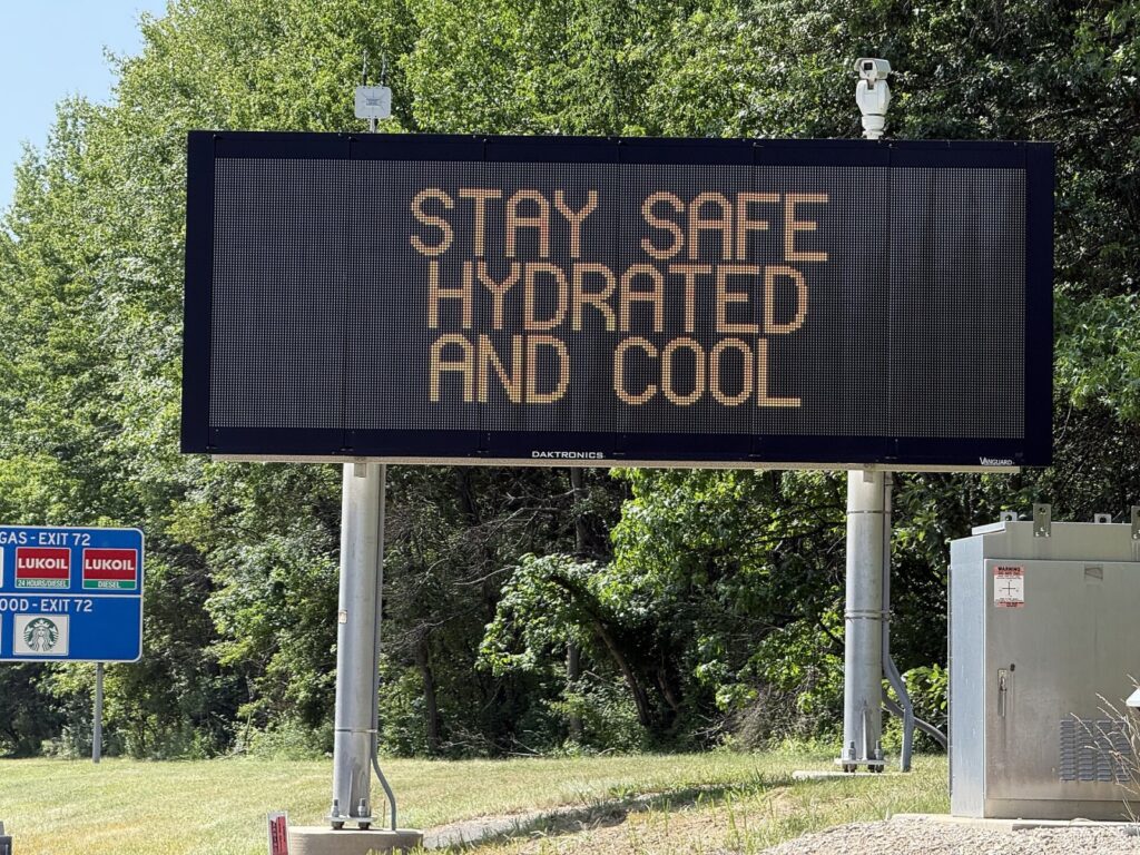Variable message sign displaying "Stay Safe Hydrated And Cool" during triple-digit heat along northbound Interstate 295 just south of Exit 72 in Hopew