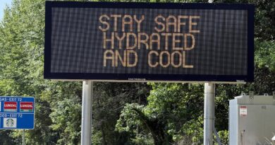 Variable message sign displaying "Stay Safe Hydrated And Cool" during triple-digit heat along northbound Interstate 295 just south of Exit 72 in Hopew