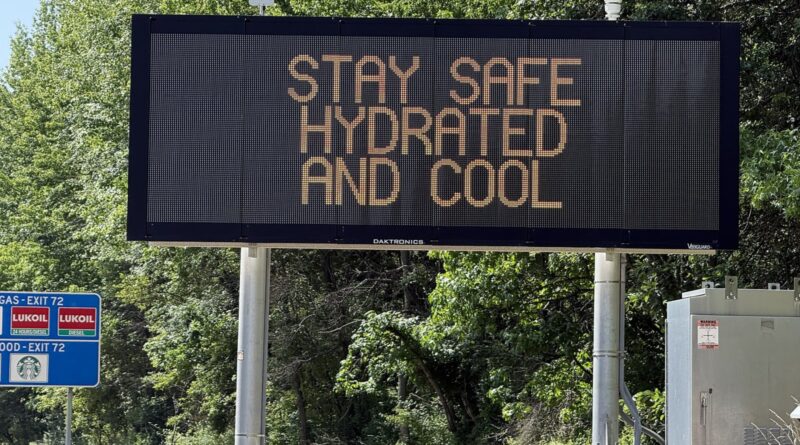 Variable message sign displaying "Stay Safe Hydrated And Cool" during triple-digit heat along northbound Interstate 295 just south of Exit 72 in Hopew